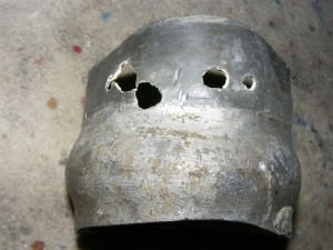 Corrosion holes in a lead toilet elbow