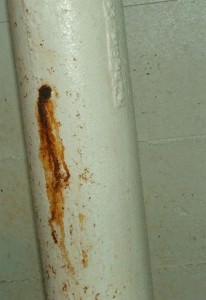 Rusting from a pin hole leak in a water pipe