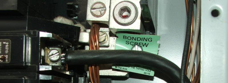Bonding screw in an electrical service panel