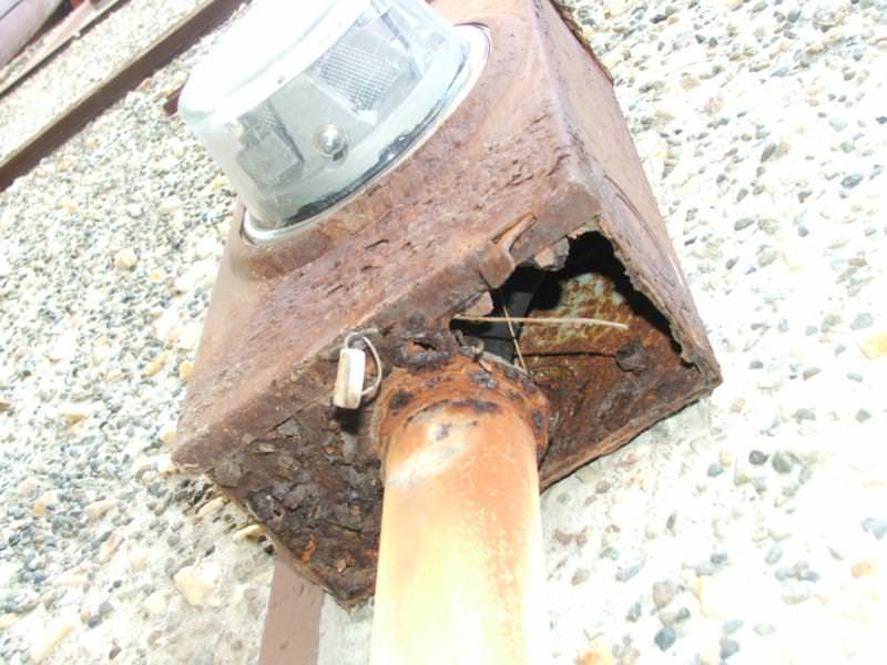 Badly corroded electrical service meter base