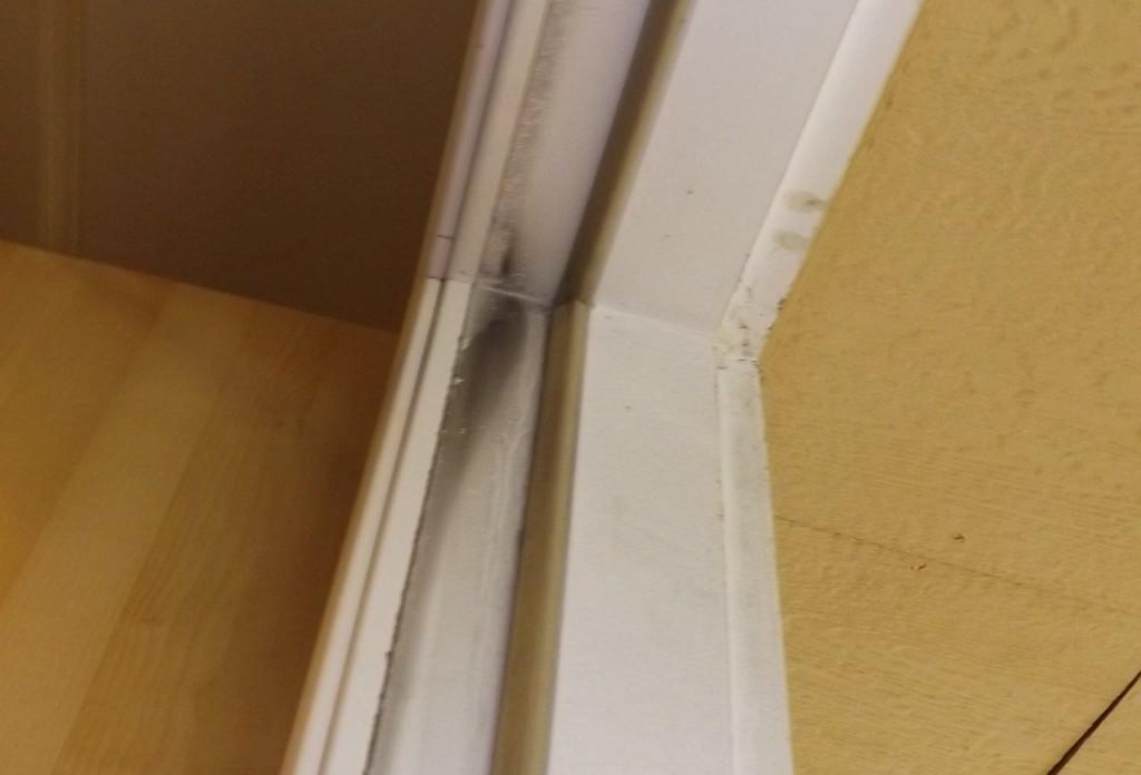 Air leakage around weather-stripping of a door